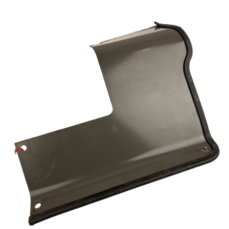 Täckplåt bakom förarstol